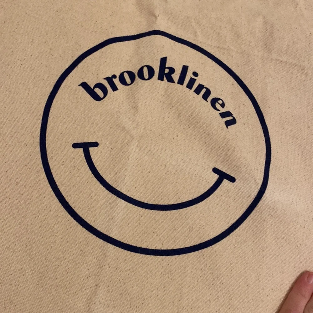 Brooklinen Cream Canvas Tote with Smiley Design
